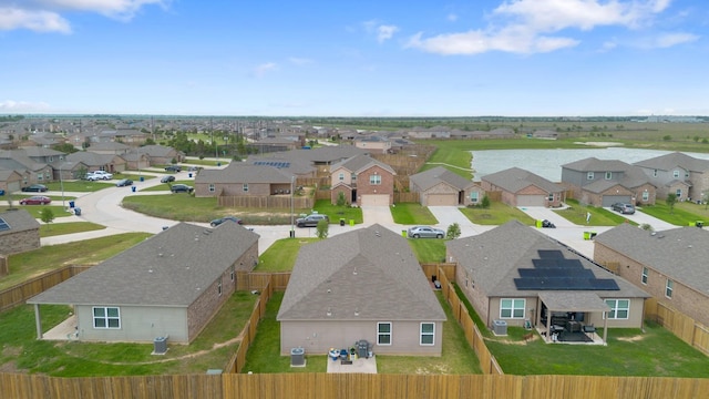 aerial view featuring a water view and a residential view