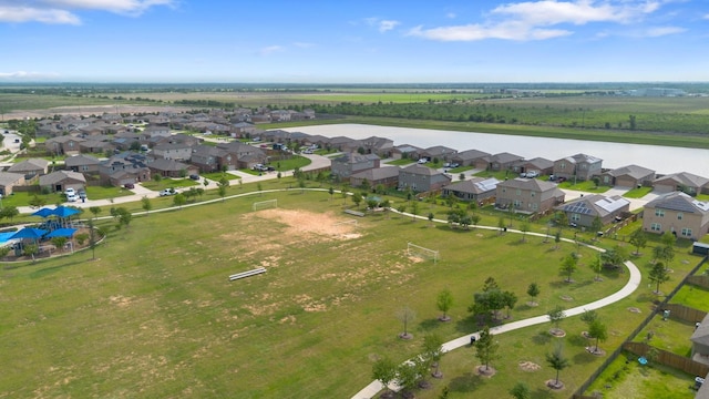 aerial view with a water view and a residential view
