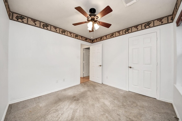 15403 Court Green Trl, Cypress, TX 77433 - unfurnished bedroom with carpet flooring, baseboards, and a ceiling fan