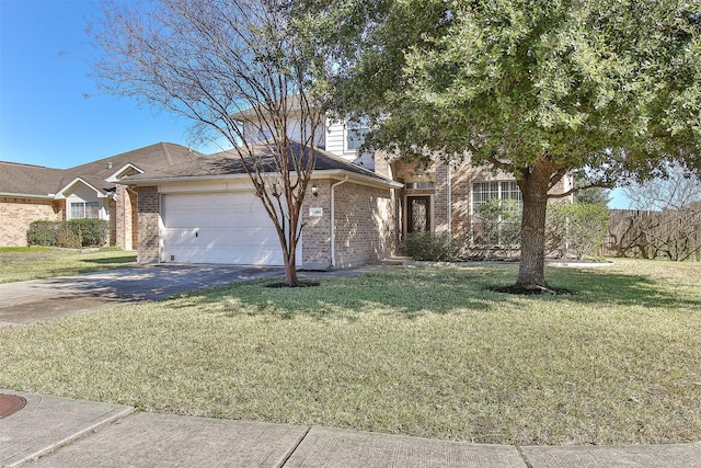 24006 Lestergate Dr, Spring, TX 77373 - view of front of house featuring aphalt driveway, a garage, a front lawn, and brick siding