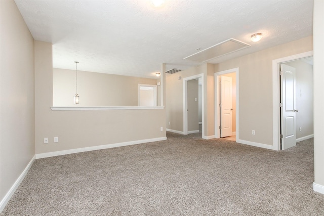 24006 Lestergate Dr, Spring, TX 77373 - empty room featuring baseboards, visible vents, attic access, and carpet floors