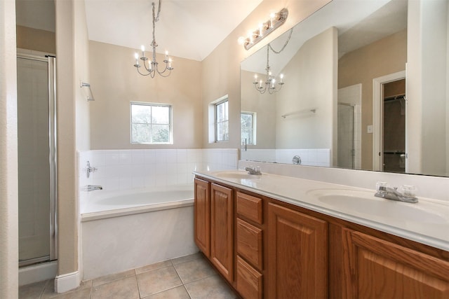 24006 Lestergate Dr, Spring, TX 77373 - full bath featuring tile patterned floors, a stall shower, a sink, and a notable chandelier