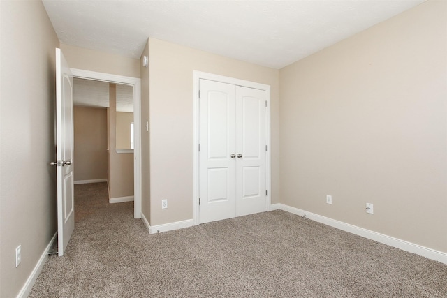 24006 Lestergate Dr, Spring, TX 77373 - unfurnished bedroom with carpet floors, a closet, and baseboards