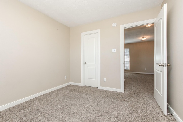 24006 Lestergate Dr, Spring, TX 77373 - spare room with baseboards and carpet flooring