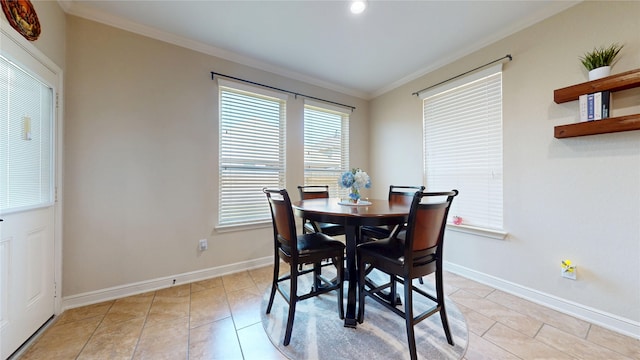 18818 Bene Vista Dr, Houston, TX 77084 - dining room with crown molding, baseboards, and light tile patterned floors