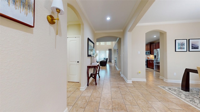 18818 Bene Vista Dr, Houston, TX 77084 - corridor with ornamental molding, arched walkways, and baseboards