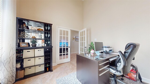 18818 Bene Vista Dr, Houston, TX 77084 - office with a towering ceiling, baseboards, and french doors