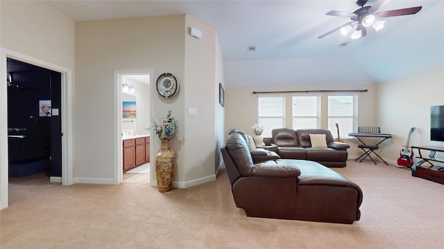 18818 Bene Vista Dr, Houston, TX 77084 - living room with vaulted ceiling, light colored carpet, baseboards, and ceiling fan