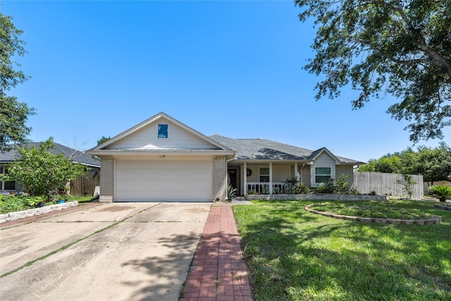 10302 Lybert Rd, Houston, TX 77041 - single story home featuring fence, brick siding, driveway, a garage, and a front lawn
