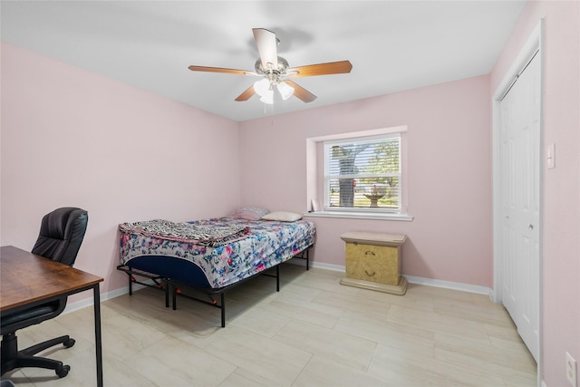 10302 Lybert Rd, Houston, TX 77041 - bedroom featuring a closet, baseboards, and a ceiling fan