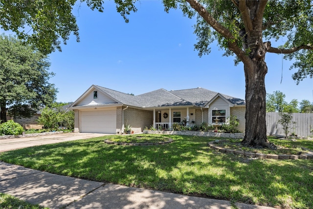 10302 Lybert Rd, Houston, TX 77041 - ranch-style house with fence, brick siding, concrete driveway, a garage, and a front yard