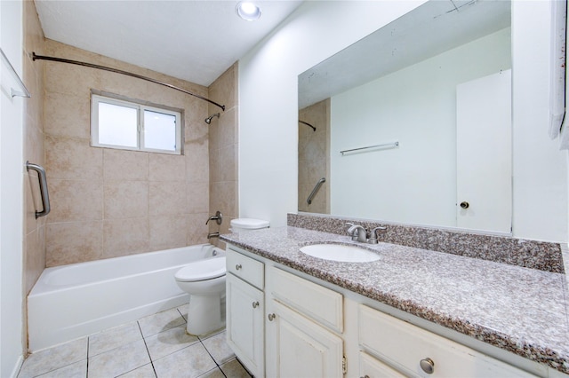 bathroom with toilet, tile patterned flooring, vanity, and tub / shower combination