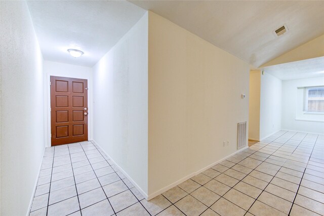 2215 Squire Dobbins Dr, Sugar Land, TX 77478 - hall with light tile patterned floors and vaulted ceiling