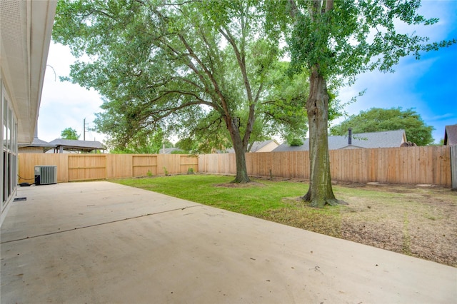 view of patio featuring central AC and a fenced backyard