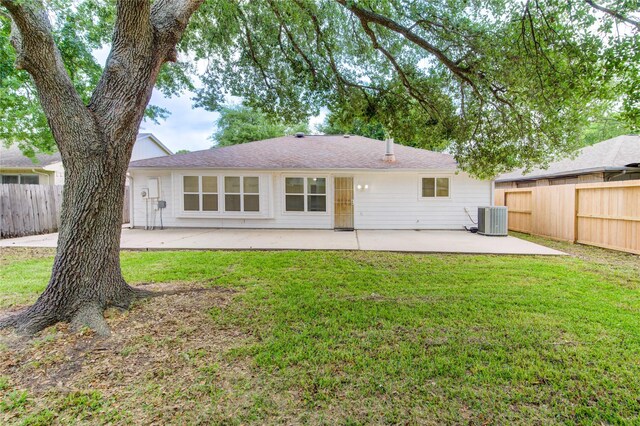 2215 Squire Dobbins Dr, Sugar Land, TX 77478 - rear view of property featuring a patio area and central AC unit