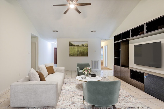 2215 Squire Dobbins Dr, Sugar Land, TX 77478 - living room with light tile patterned floors, a ceiling fan, built in shelves, and high vaulted ceiling