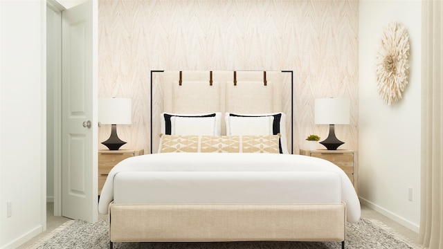 carpeted bedroom featuring baseboards