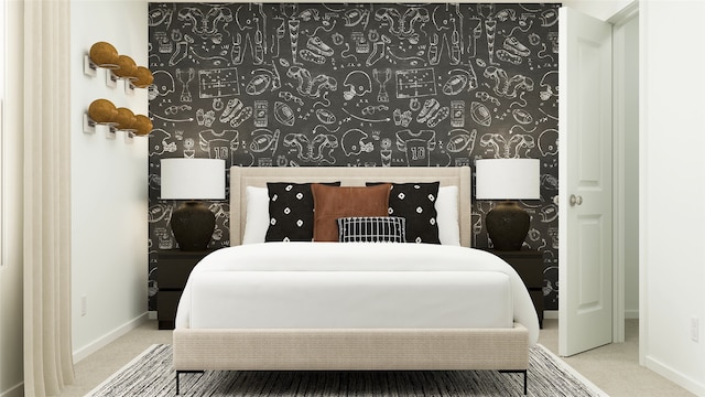 bedroom featuring carpet and baseboards