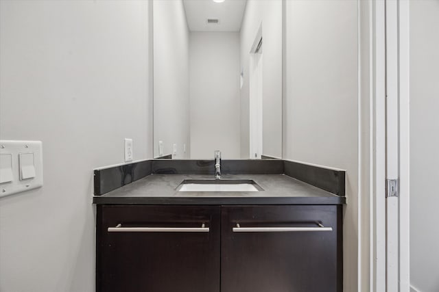 bathroom with visible vents and vanity