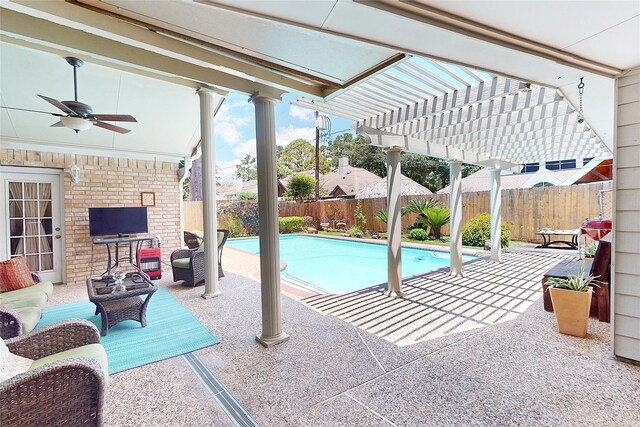 12934 Bristol Berry Dr, Cypress, TX 77429 - view of swimming pool with a pergola, a patio, a ceiling fan, and a fenced backyard