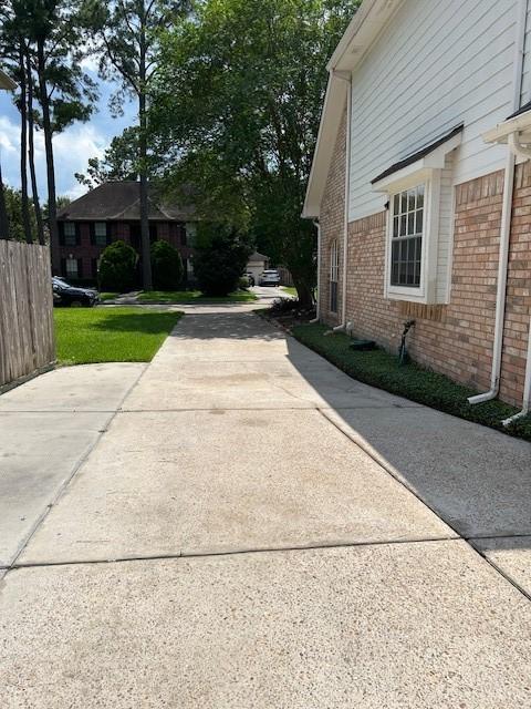 12934 Bristol Berry Dr, Cypress, TX 77429 - view of side of property featuring brick siding
