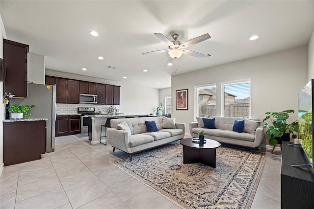 29622 Weber Way Ct, Katy, TX 77494 - living area with ceiling fan, recessed lighting, and light tile patterned flooring
