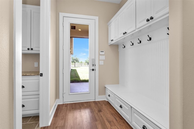 1650 Winding Canyon Ct, Katy, TX 77493 - mudroom featuring baseboards and dark wood-style floors