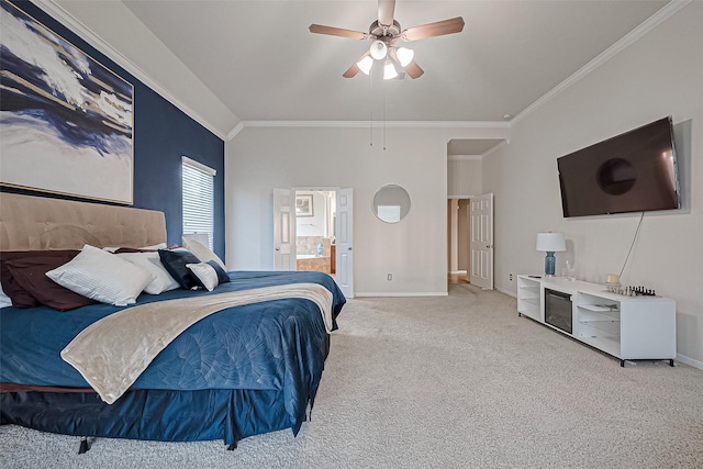 bedroom with connected bathroom, crown molding, carpet flooring, and baseboards