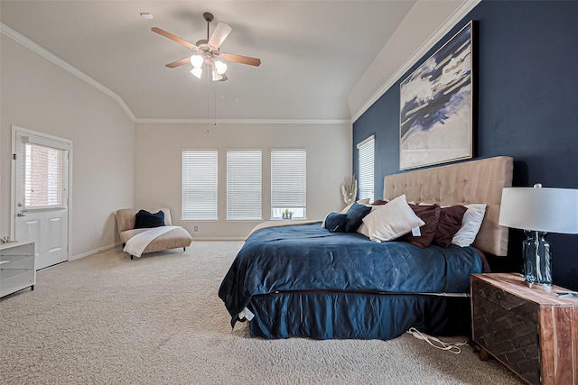 bedroom featuring lofted ceiling, a ceiling fan, baseboards, ornamental molding, and carpet floors