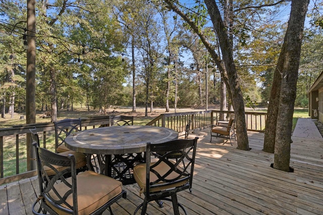2540 Howell Rd, Corrigan, TX 75939 - wooden deck with outdoor dining area