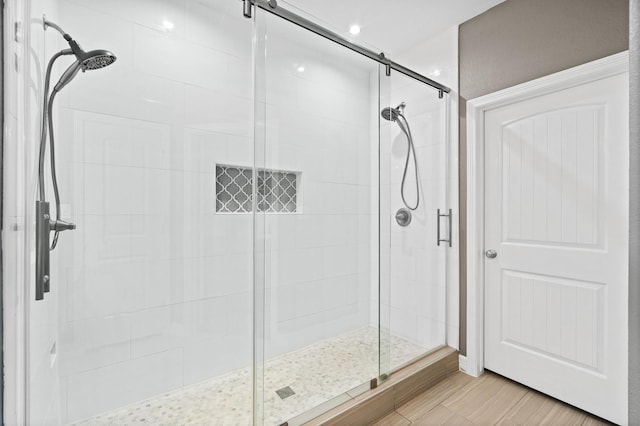 full bathroom featuring a shower stall