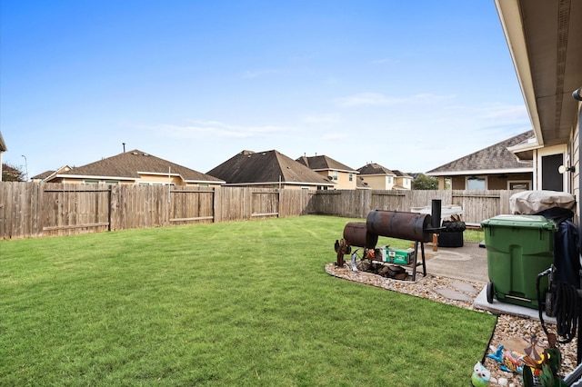 view of yard featuring a fenced backyard