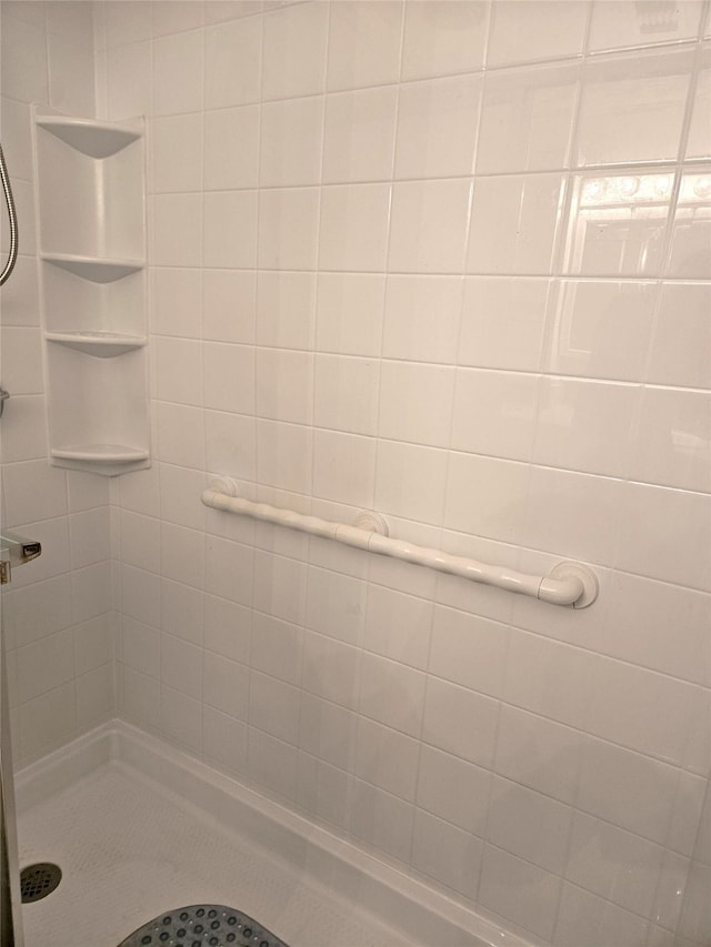 full bath featuring a stall shower