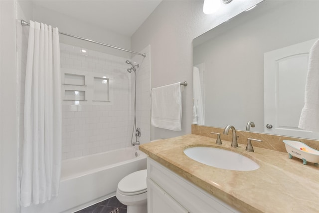 full bathroom featuring toilet, shower / tub combo with curtain, and vanity