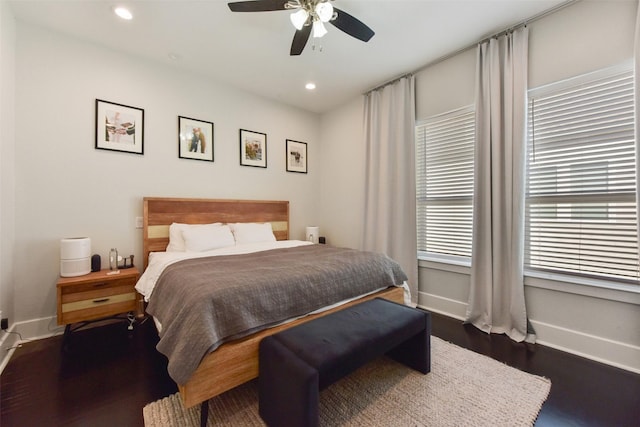 bedroom featuring baseboards, dark wood-style flooring, ceiling fan, and recessed lighting