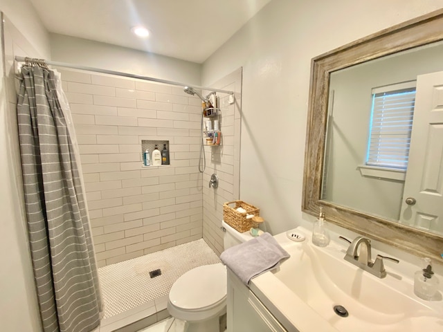 685 W 4th St, Groveton, TX 75845 - bathroom featuring a stall shower, vanity, and toilet