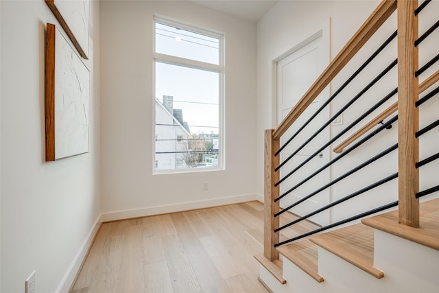 411 W Drew St, Houston, TX 77006 - interior space featuring wood finished floors, stairway, and baseboards