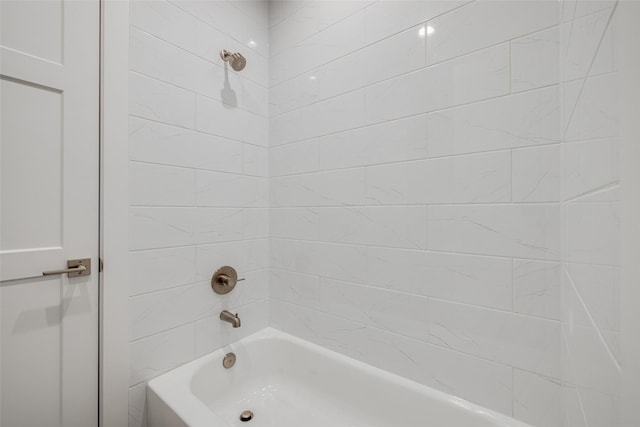 411 W Drew St, Houston, TX 77006 - bathroom featuring tub / shower combination