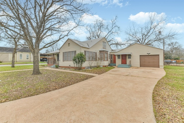 508 Texas St, Brenham, TX 77833 - bungalow-style home featuring a front yard, an attached garage, crawl space, concrete driveway, and entry steps