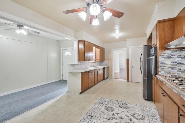 508 Texas St, Brenham, TX 77833 - kitchen with light floors, appliances with stainless steel finishes, and ceiling fan