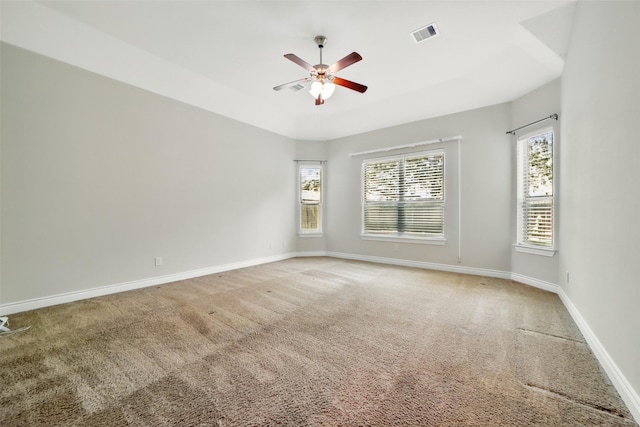 2106 Wild Peregrine Cir, Katy, TX 77494 - spare room featuring light colored carpet, a ceiling fan, and baseboards