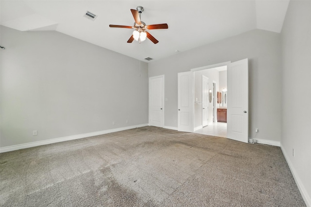 2106 Wild Peregrine Cir, Katy, TX 77494 - unfurnished bedroom featuring vaulted ceiling, carpet, baseboards, connected bathroom, and a ceiling fan