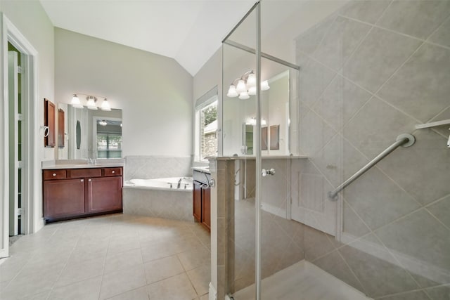 2106 Wild Peregrine Cir, Katy, TX 77494 - full bath featuring a bath, vanity, tile patterned floors, a shower stall, and vaulted ceiling