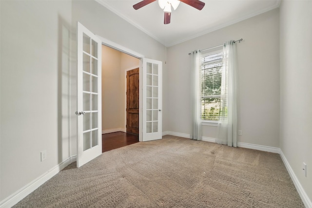 2106 Wild Peregrine Cir, Katy, TX 77494 - carpeted spare room featuring french doors, ornamental molding, ceiling fan, and baseboards