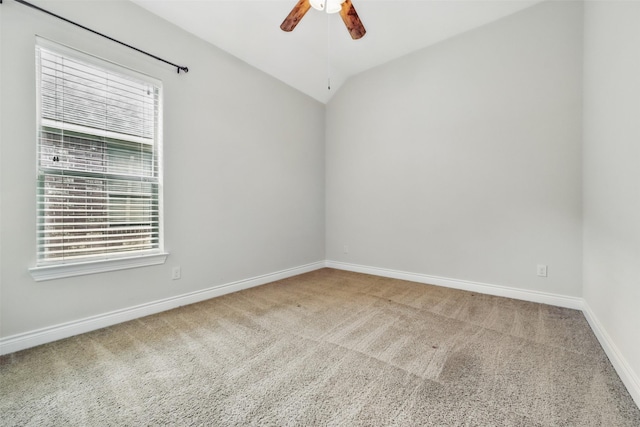 2106 Wild Peregrine Cir, Katy, TX 77494 - empty room with carpet flooring, plenty of natural light, a ceiling fan, baseboards, and lofted ceiling
