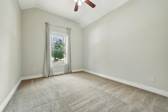 2106 Wild Peregrine Cir, Katy, TX 77494 - spare room featuring vaulted ceiling, a ceiling fan, carpet floors, and baseboards