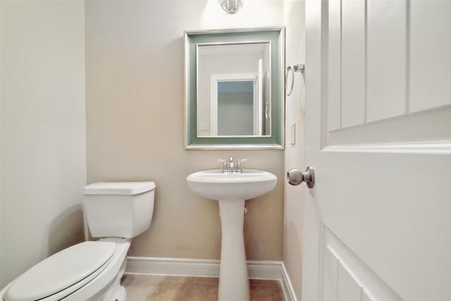 2106 Wild Peregrine Cir, Katy, TX 77494 - bathroom with toilet and baseboards
