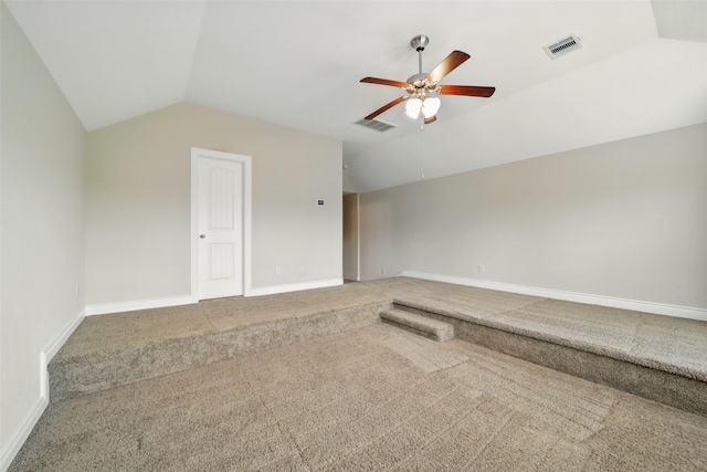 2106 Wild Peregrine Cir, Katy, TX 77494 - bonus room featuring vaulted ceiling, a ceiling fan, carpet floors, and baseboards