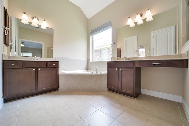2106 Wild Peregrine Cir, Katy, TX 77494 - full bath with a bath, tile patterned flooring, two vanities, lofted ceiling, and ceiling fan