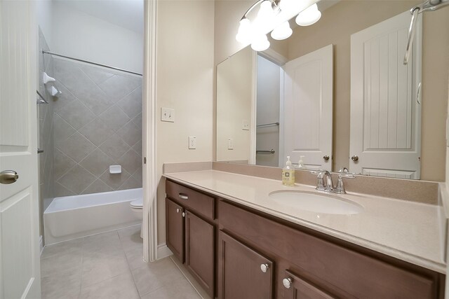 2106 Wild Peregrine Cir, Katy, TX 77494 - bathroom featuring vanity, tile patterned flooring, and bathtub / shower combination